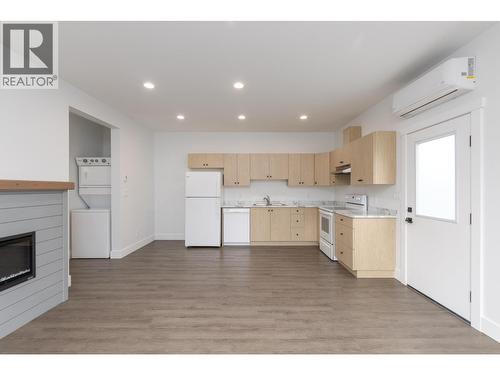 1441 20 Avenue Se Unit# 4, Salmon Arm, BC - Indoor Photo Showing Kitchen With Fireplace