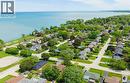 Aerial perspective showcasing a residential neighborhood with verdant trees and manicured lawns - 439 Murray Street, Grimsby, ON  - Outdoor With Body Of Water With View 
