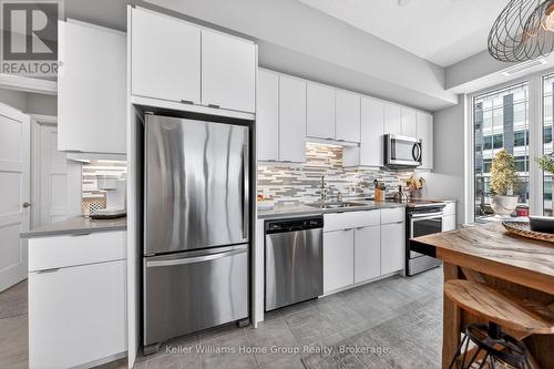 701 - 73 Arthur Street S, Guelph (St. Patrick'S Ward), ON - Indoor Photo Showing Kitchen With Upgraded Kitchen