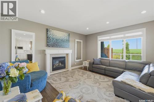 719 Salloum Crescent, Saskatoon, SK - Indoor Photo Showing Living Room With Fireplace
