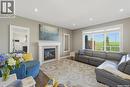 719 Salloum Crescent, Saskatoon, SK  - Indoor Photo Showing Living Room With Fireplace 