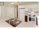 539 Yates Road Unit# 308, Kelowna, BC  - Indoor Photo Showing Kitchen With Double Sink 