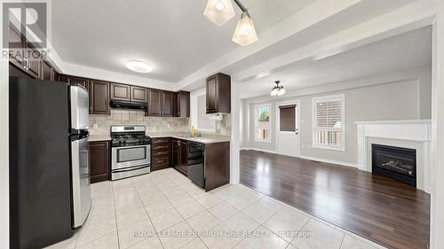 108 Argento Crescent, Vaughan, ON - Indoor Photo Showing Kitchen With Fireplace