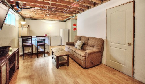 Salle familiale - 358 Rue Des Merles, Nominingue, QC - Indoor Photo Showing Basement