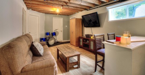 Salle familiale - 358 Rue Des Merles, Nominingue, QC - Indoor Photo Showing Basement