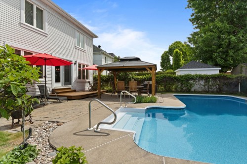 Cour - 14 Rue St-Onge, Châteauguay, QC - Outdoor With In Ground Pool With Deck Patio Veranda With Backyard