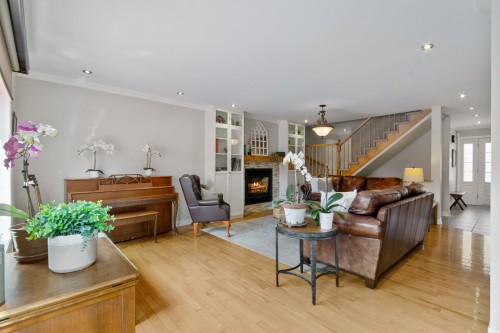 Salon - 14 Rue St-Onge, Châteauguay, QC - Indoor Photo Showing Living Room With Fireplace