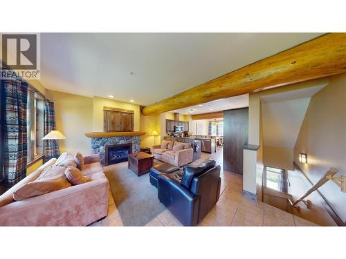 1351 Gerry Sorensen Way Unit# J2-B, Kimberley, BC - Indoor Photo Showing Living Room With Fireplace