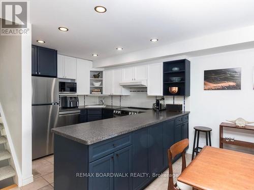Stainless Steel Appliances in Kitchen - 41 Putman Avenue, Ottawa, ON - Indoor Photo Showing Other Room