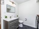 Beautifully renovated Bath & Laundry Room by Foyer - 41 Putman Avenue, Ottawa, ON  - Indoor Photo Showing Bathroom 