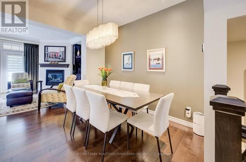 10 - 435 Winchester Drive, Waterloo, ON - Indoor Photo Showing Dining Room With Fireplace