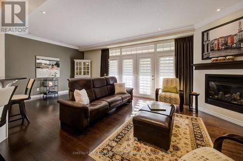 10 - 435 Winchester Drive, Waterloo, ON - Indoor Photo Showing Living Room With Fireplace