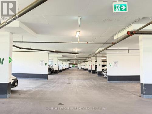 607 - 105 Oneida Crescent, Richmond Hill, ON - Indoor Photo Showing Garage