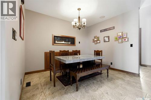 7502 Lilac Place, Regina, SK - Indoor Photo Showing Living Room With Fireplace