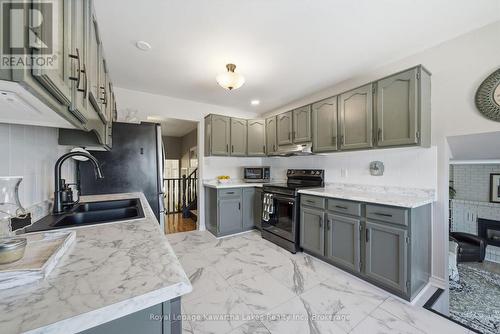 32 Andrew Drive, Kawartha Lakes (Lindsay), ON - Indoor Photo Showing Kitchen With Double Sink