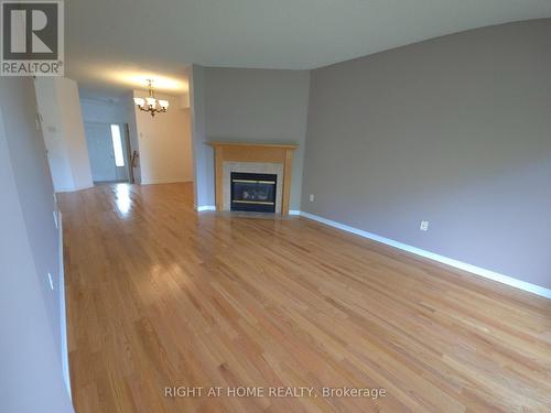 142 Lilibet Crescent E, Ottawa, ON - Indoor Photo Showing Living Room With Fireplace