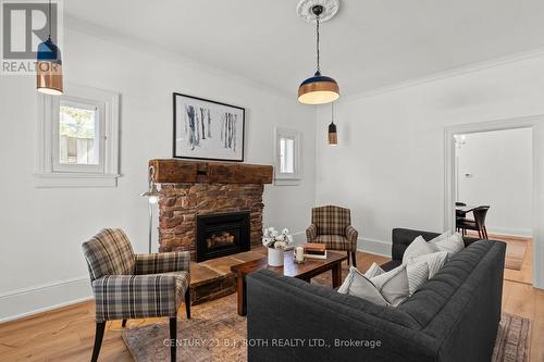 13 Nelson Square E, Barrie, ON - Indoor Photo Showing Living Room With Fireplace