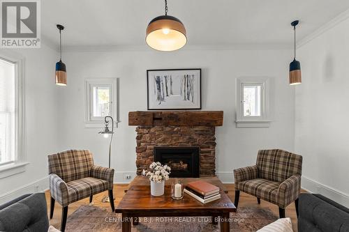 13 Nelson Square E, Barrie, ON - Indoor Photo Showing Living Room With Fireplace