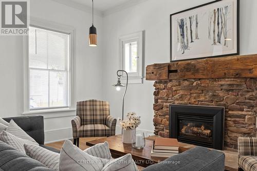 13 Nelson Square E, Barrie, ON - Indoor Photo Showing Living Room With Fireplace