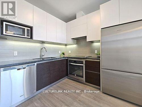 215 - 15 Water Walk Drive, Markham, ON - Indoor Photo Showing Kitchen With Upgraded Kitchen