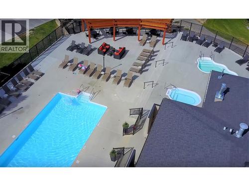 400 Bighorn Boulevard Unit# 416 K1, Radium Hot Springs, BC - Outdoor With In Ground Pool
