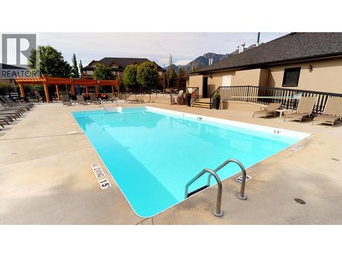 400 Bighorn Boulevard Unit# 416 K1, Radium Hot Springs, BC - Outdoor With In Ground Pool With Deck Patio Veranda