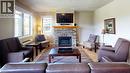 400 Bighorn Boulevard Unit# 416 K1, Radium Hot Springs, BC  - Indoor Photo Showing Living Room With Fireplace 