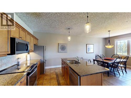 400 Bighorn Boulevard Unit# 416 K1, Radium Hot Springs, BC - Indoor Photo Showing Kitchen