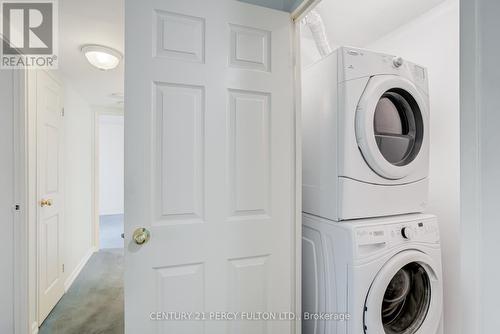 608 - 121 Trudelle Street, Toronto, ON - Indoor Photo Showing Laundry Room