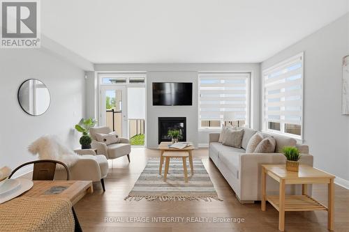 862 Moses Tennisco Street, Ottawa, ON - Indoor Photo Showing Living Room With Fireplace