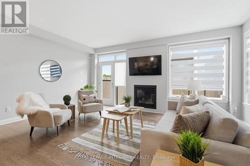 862 Moses Tennisco Street, Ottawa, ON - Indoor Photo Showing Living Room With Fireplace