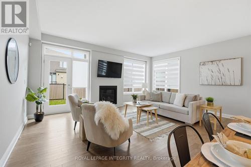 862 Moses Tennisco Street, Ottawa, ON - Indoor Photo Showing Living Room With Fireplace
