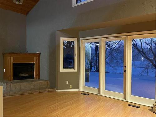 224 Crescent Drive, Swan River, MB - Indoor With Fireplace
