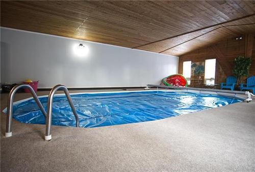 ** Pool is not filled at the moment** - 224 Crescent Drive, Swan River, MB - Indoor Photo Showing Other Room With In Ground Pool