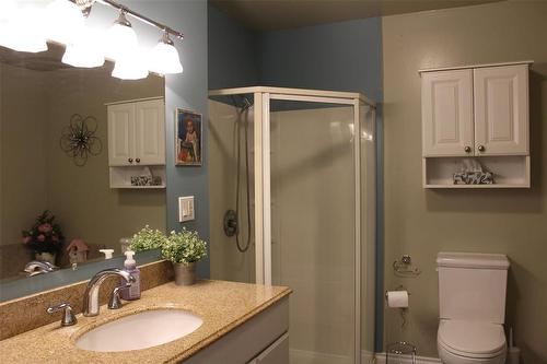 Main bathroom is absolutely huge! Corner shower and loads of storage cabinets. - 387 William Street, Arborg, MB - Indoor Photo Showing Bathroom
