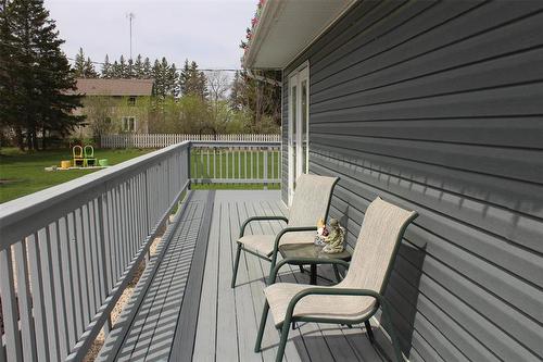 South facing side of the wrap around deck. - 387 William Street, Arborg, MB - Outdoor With Exterior