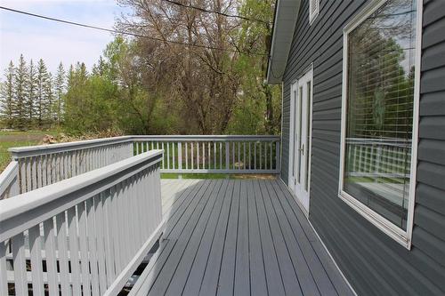 Deck had new paint in 2025. Loads of space for lot's of outdoor furniture. - 387 William Street, Arborg, MB - Outdoor With Deck Patio Veranda With Exterior