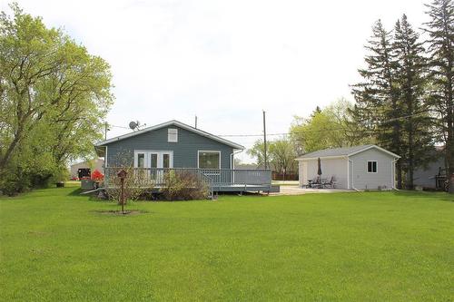 Siding done in 2008, roof cap done in 2025. 200 amp service. Furnace is in the crawlspace. - 387 William Street, Arborg, MB - Outdoor With Deck Patio Veranda