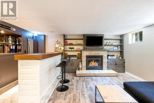 26 Dickson Road, Collingwood, ON - Indoor Photo Showing Living Room With Fireplace