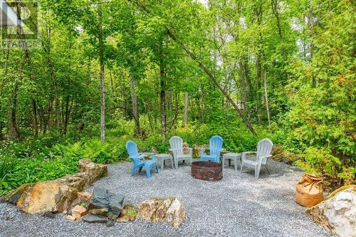 AI Generated - 25 Lakeland Avenue, Trent Lakes, ON - Outdoor With Body Of Water