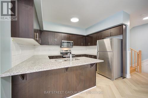 kitch - 3 - 626 Rexdale Boulevard, Toronto, ON - Indoor Photo Showing Kitchen With Stainless Steel Kitchen With Double Sink