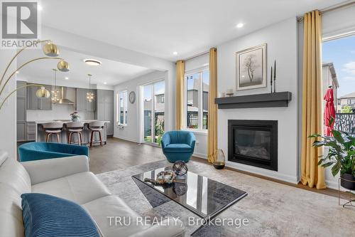 202 Skipper Drive, Ottawa, ON - Indoor Photo Showing Living Room With Fireplace