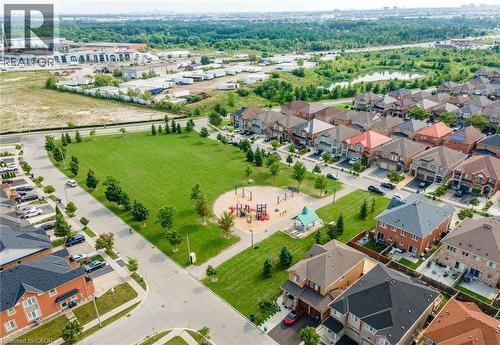 Aerial perspective showcasing a residential area with a community park and playground - 14 Faye Street, Brampton, ON - Outdoor With View
