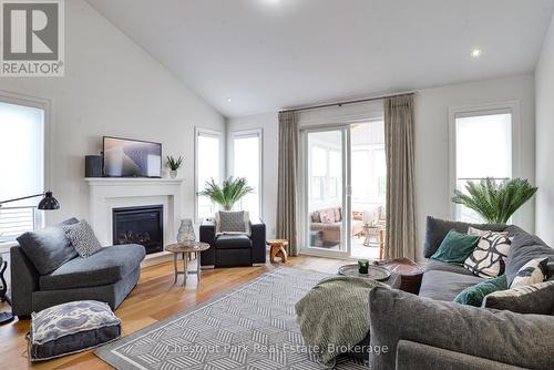 custom blinds throughout - 5 Hunter Place, Bracebridge (Macaulay), ON - Indoor Photo Showing Living Room With Fireplace