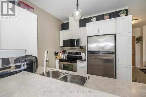 514 - 44 Bond Street W, Oshawa, ON - Indoor Photo Showing Kitchen With Stainless Steel Kitchen With Double Sink