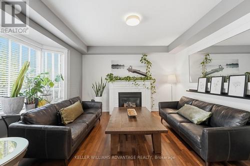 4 Cranberry Lane, Barrie, ON - Indoor Photo Showing Living Room With Fireplace