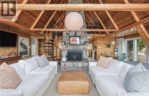 68 Parker Island Road, Lions Head, ON - Indoor Photo Showing Living Room With Fireplace