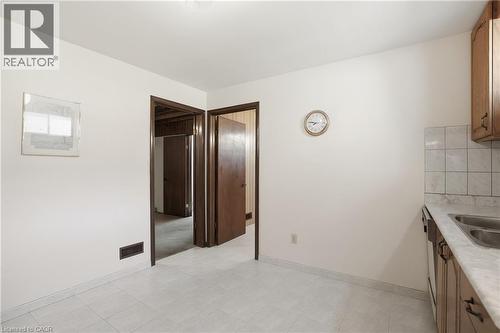 64 Eastbury Drive, Stoney Creek, ON - Indoor Photo Showing Kitchen With Double Sink