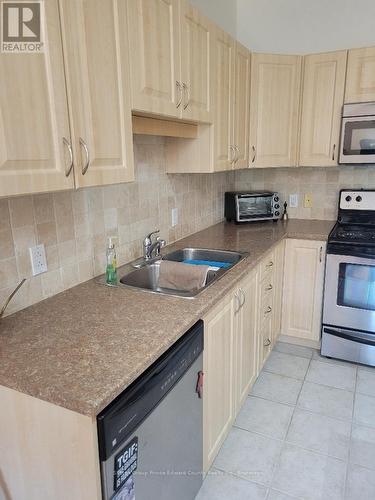 Double sinks and a garburator - 5 - 16 Lane Avenue, Belleville (Belleville Ward), ON - Indoor Photo Showing Kitchen With Double Sink