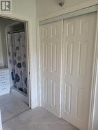 Oodles of closet space in primary bedroom - 